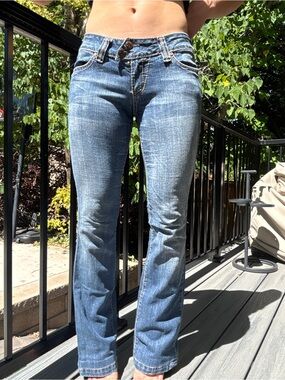Low-Rise Blue Bootcut Jeans with Subtle Fading